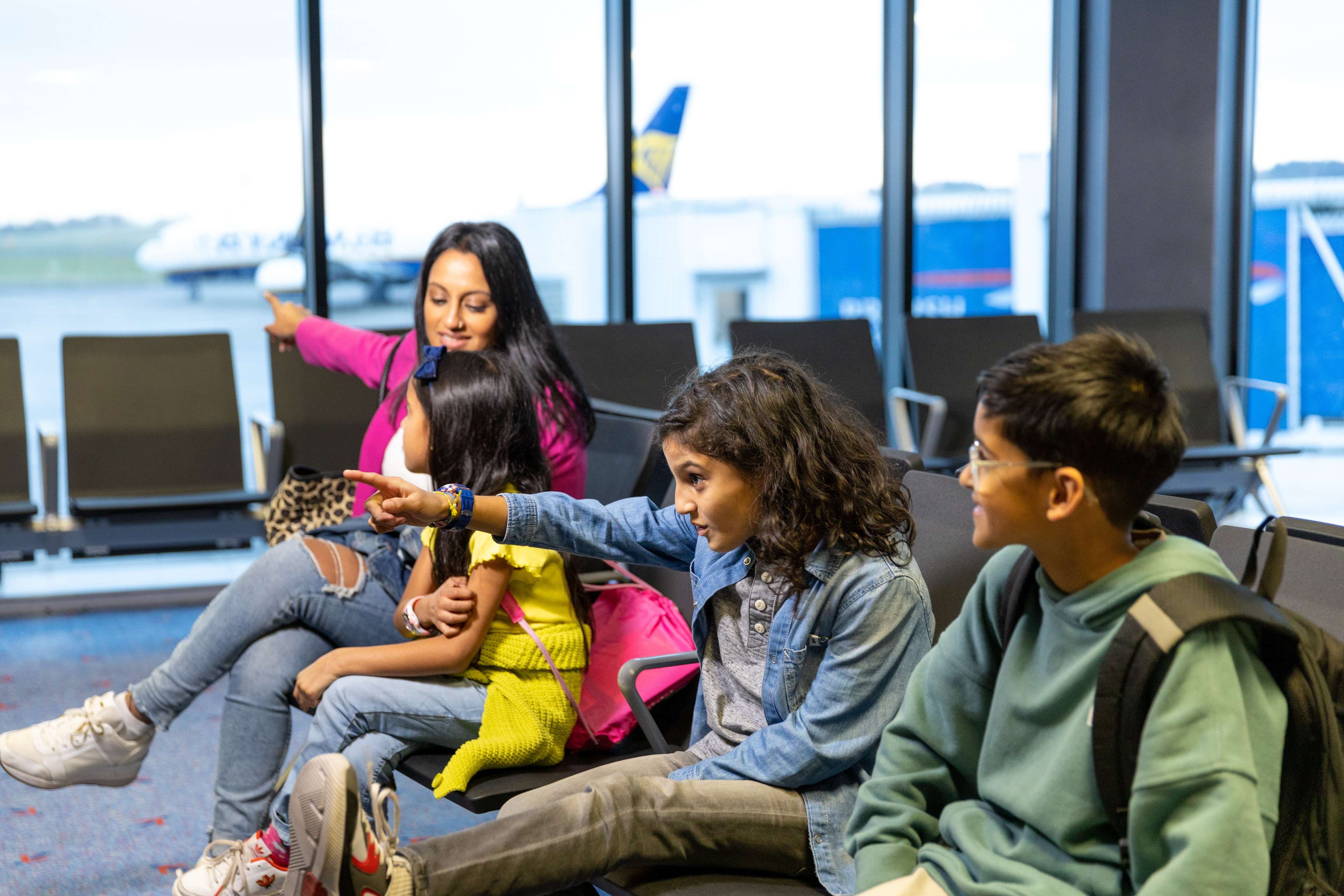 Family in departure lounge