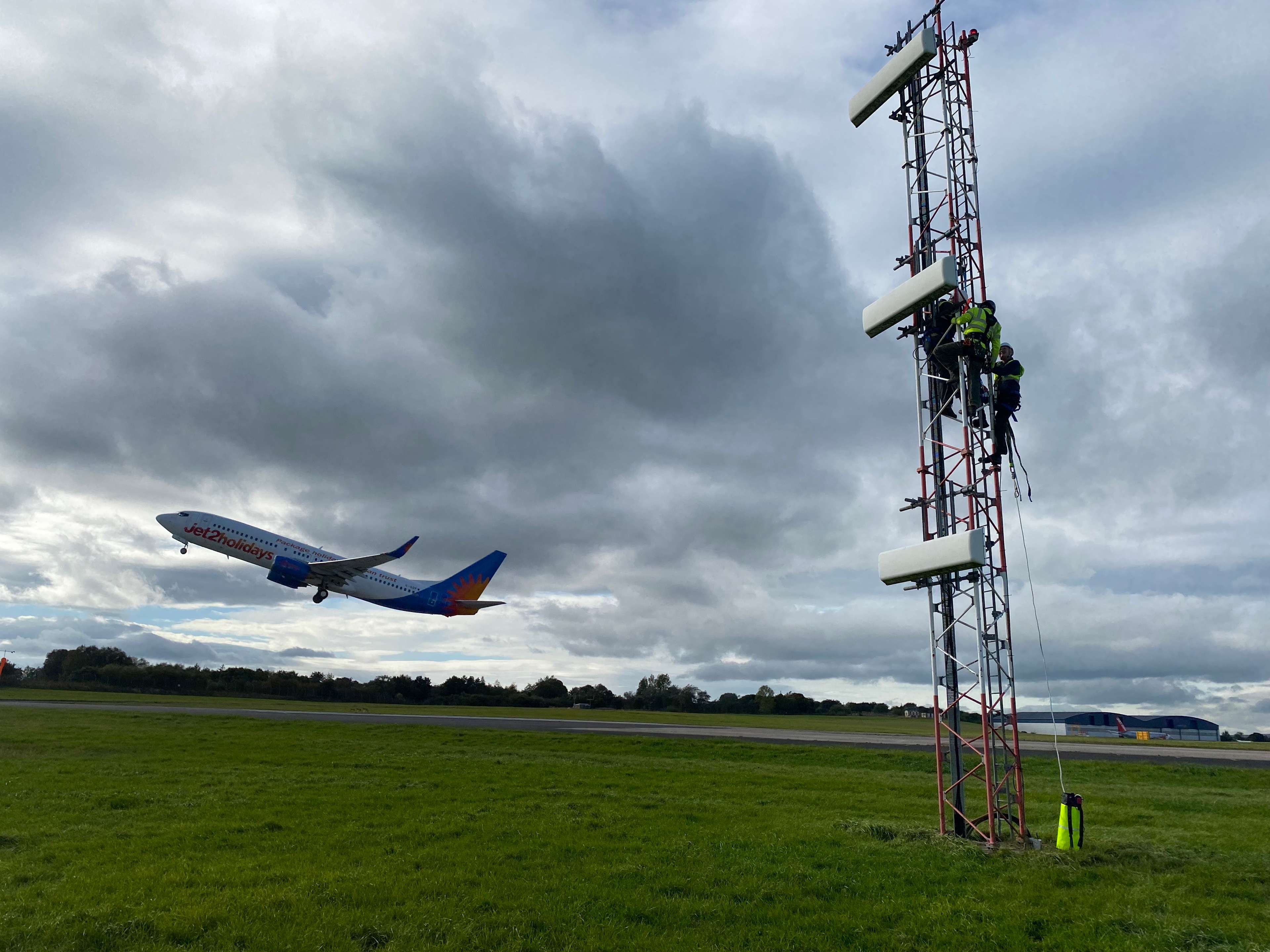 plane take off with tower